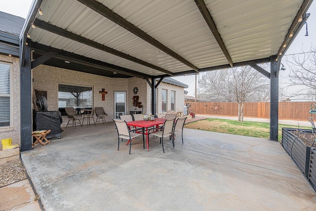 view of patio / terrace with fence and outdoor dining area