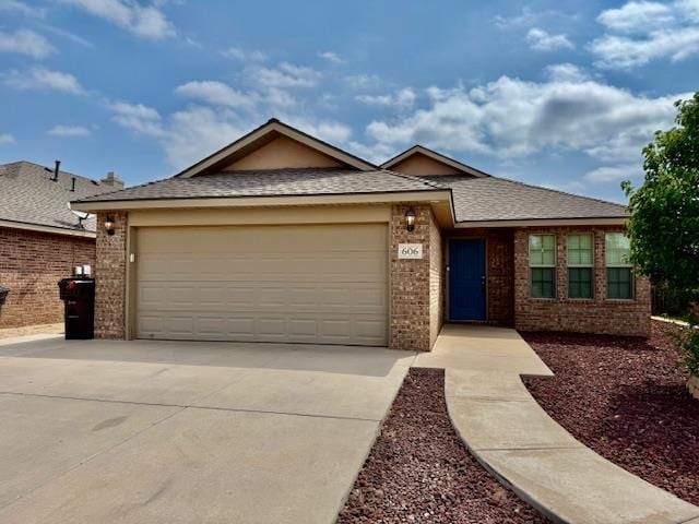 606 Memorial Ct, Midland, TX 79706 - ranch-style house featuring brick siding, concrete driveway, an attached garage, and roof with shingles
