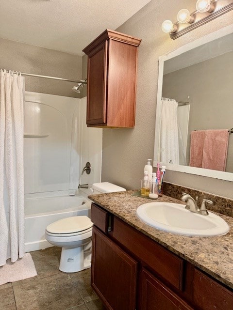 full bathroom with vanity, toilet, tile patterned flooring, and shower / tub combo