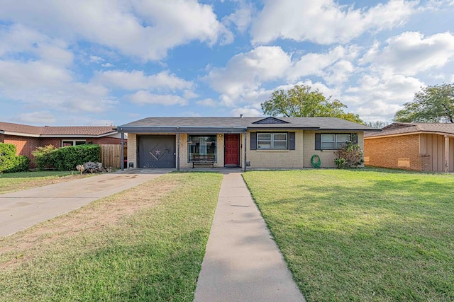 1741 Purdue Ave, Big Spring, TX 79720 - ranch-style house featuring a front lawn