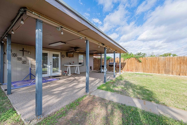 view of patio / terrace featuring french doors and ceiling fan