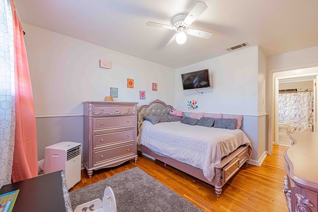 bedroom featuring ceiling fan and hardwood / wood-style flooring