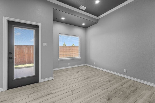8514 Santa Isabella, Odessa, TX 79765 - empty room featuring wood finished floors, crown molding, visible vents, baseboards, and recessed lighting