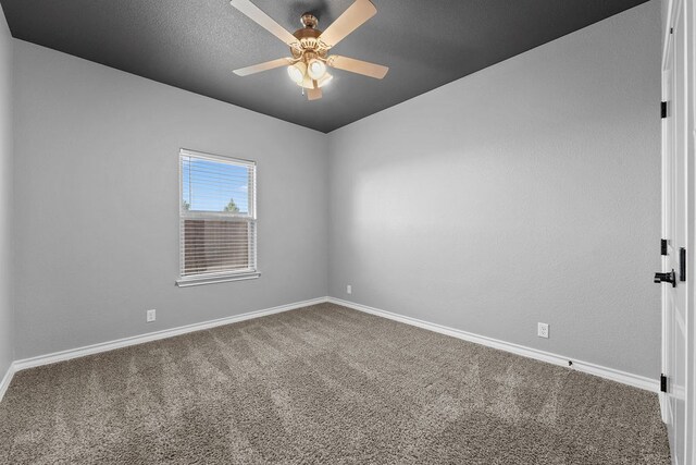 8514 Santa Isabella, Odessa, TX 79765 - empty room with carpet, baseboards, and ceiling fan