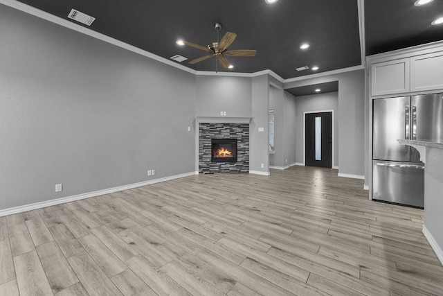 8514 Santa Isabella, Odessa, TX 79765 - unfurnished living room with a ceiling fan, a fireplace, visible vents, ornamental molding, and recessed lighting