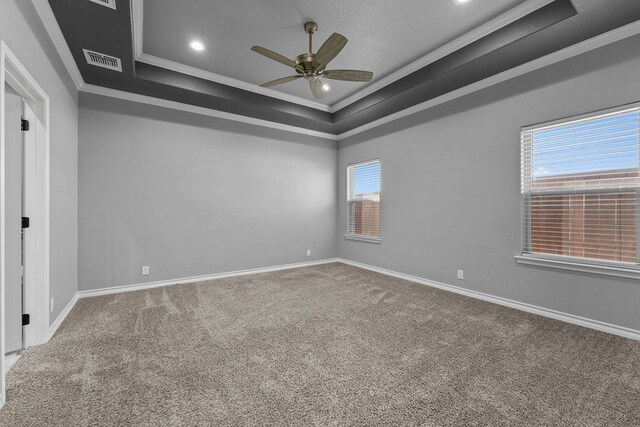 8514 Santa Isabella, Odessa, TX 79765 - carpeted spare room featuring visible vents, crown molding, a ceiling fan, a raised ceiling, and baseboards