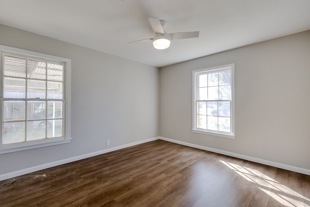 unfurnished room featuring hardwood / wood-style flooring and ceiling fan