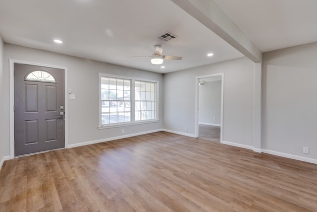 foyer featuring ceiling fan and light hardwood / wood-style flooring