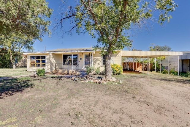 view of front facade featuring a carport