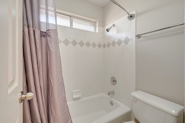 1608 Castleford Rd, Midland, TX 79705 - full bath with toilet and shower / bathtub combination with curtain