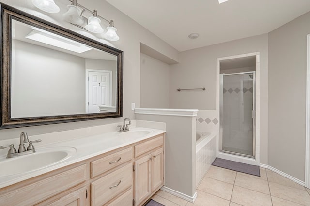 1608 Castleford Rd, Midland, TX 79705 - bathroom with tile patterned flooring, a sink, and a stall shower