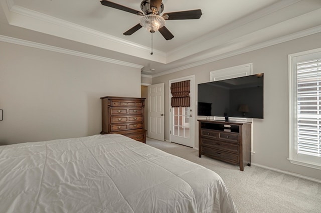 1608 Castleford Rd, Midland, TX 79705 - carpeted bedroom with baseboards, ornamental molding, a tray ceiling, and ceiling fan