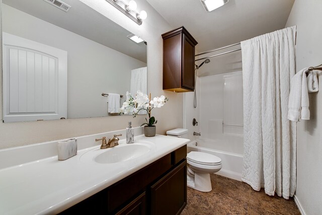 full bathroom featuring shower / tub combo, vanity, toilet, and visible vents