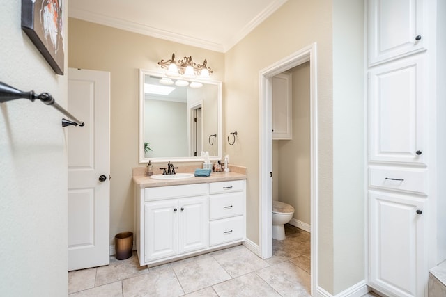 bathroom featuring tile patterned floors, toilet, crown molding, baseboards, and vanity