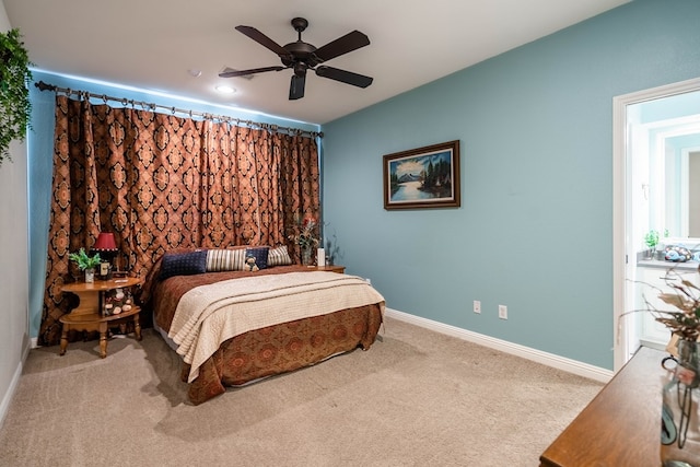 bedroom with baseboards, carpet, and ceiling fan