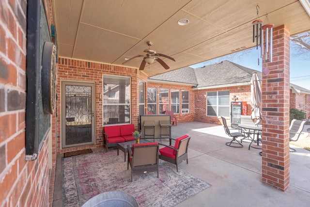 view of patio / terrace with an outdoor living space and ceiling fan