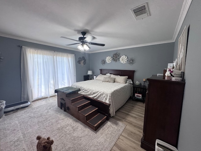3212 Fannin Ave, Midland, TX 79705 - bedroom with light wood-style flooring, ceiling fan, and ornamental molding