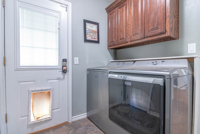 4100 Skyline Dr, Midland, TX 79707 - washroom with cabinet space and washing machine and dryer