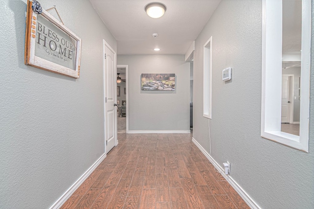 4100 Skyline Dr, Midland, TX 79707 - corridor featuring wood finished floors and a textured wall