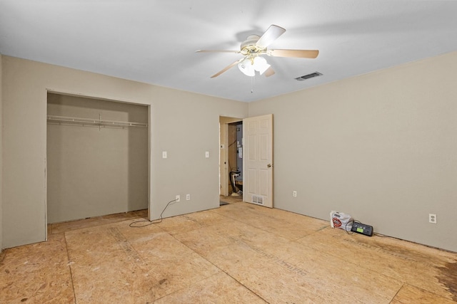 unfurnished bedroom featuring a closet and ceiling fan