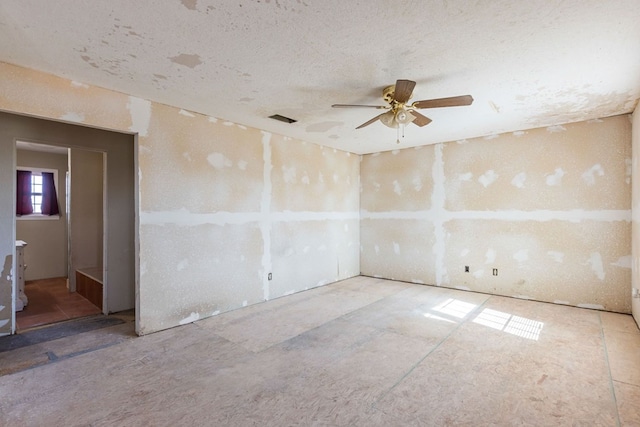 spare room featuring ceiling fan