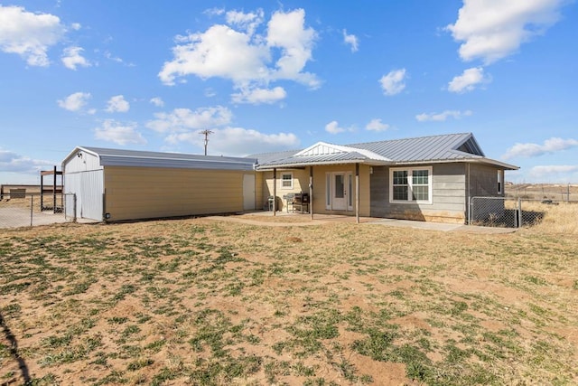 rear view of house featuring a patio area