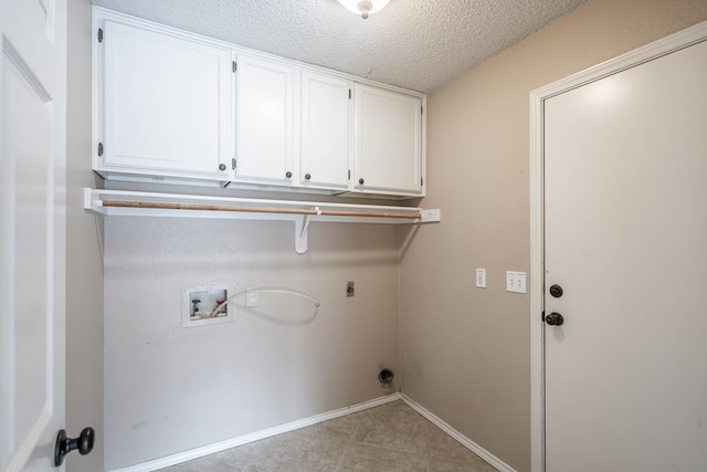 washroom with a textured ceiling, washer hookup, baseboards, cabinet space, and electric dryer hookup