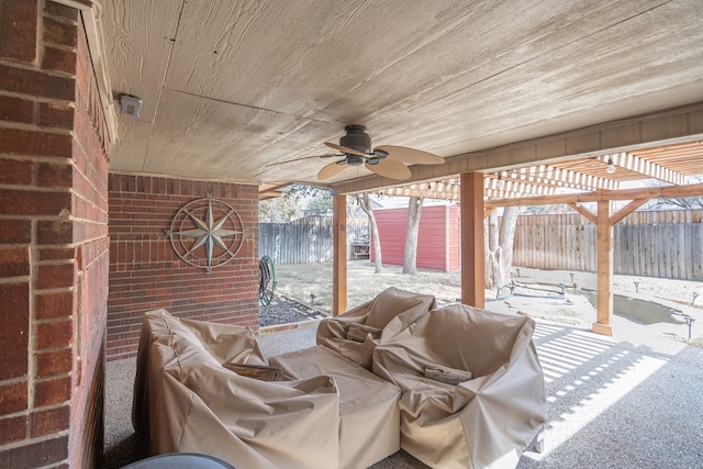 view of patio featuring a fenced backyard and a ceiling fan