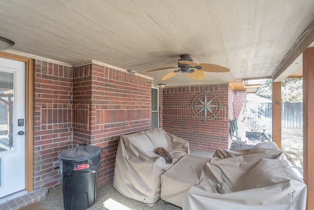 view of patio / terrace featuring ceiling fan and fence