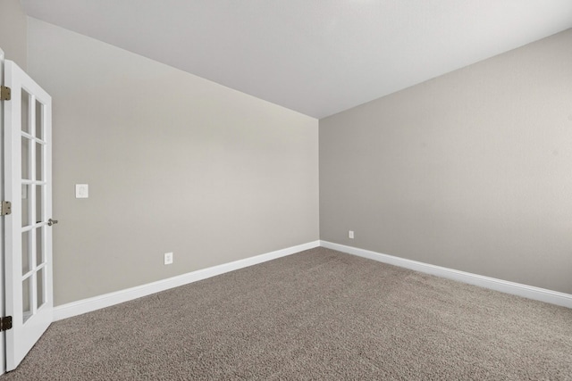 1803 Overshine Ln, Midland, TX 79705 - unfurnished room featuring french doors and carpet floors