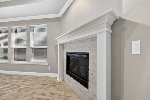 1803 Overshine Ln, Midland, TX 79705 - detailed view of wood finished floors and a brick fireplace