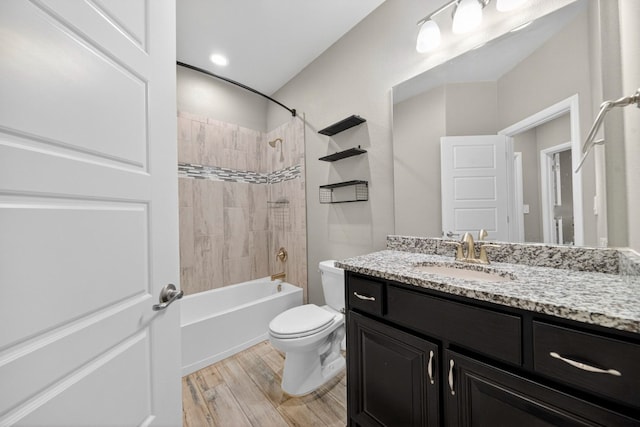 1803 Overshine Ln, Midland, TX 79705 - full bathroom featuring vanity, shower / bathtub combination, and wood finished floors