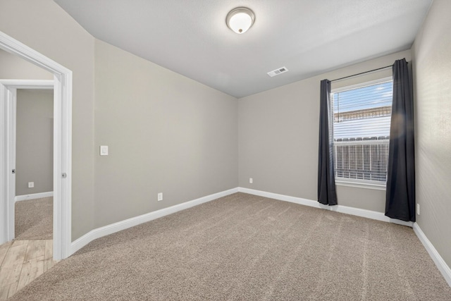 1803 Overshine Ln, Midland, TX 79705 - unfurnished room featuring light carpet and baseboards