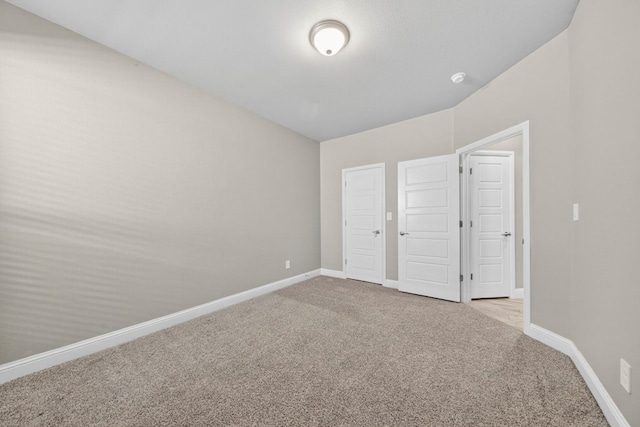 1803 Overshine Ln, Midland, TX 79705 - unfurnished bedroom featuring carpet and baseboards