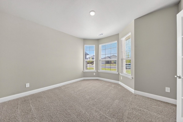 1803 Overshine Ln, Midland, TX 79705 - carpeted empty room featuring baseboards