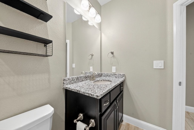 1803 Overshine Ln, Midland, TX 79705 - bathroom with vanity and toilet
