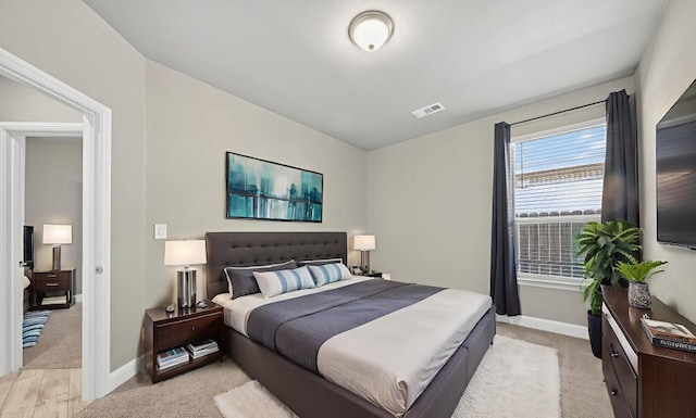 1803 Overshine Ln, Midland, TX 79705 - bedroom with baseboards and light colored carpet