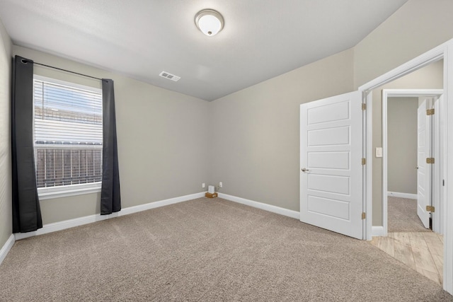 1803 Overshine Ln, Midland, TX 79705 - empty room featuring carpet and baseboards