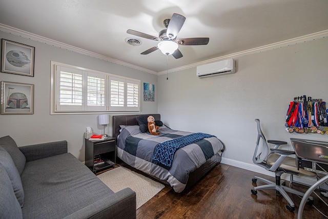 bedroom with visible vents, a wall mounted AC, hardwood / wood-style flooring, baseboards, and ornamental molding
