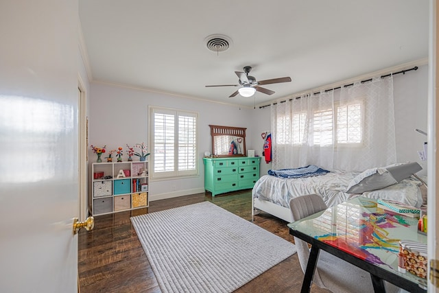 bedroom featuring ornamental molding, multiple windows, dark wood-style flooring, and visible vents
