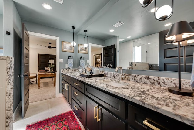 909 Pine Ct, Midland, TX 79705 - full bath with double vanity, tile patterned flooring, tiled shower, recessed lighting, and ceiling fan