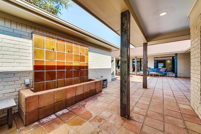 909 Pine Ct, Midland, TX 79705 - view of patio featuring outdoor lounge area