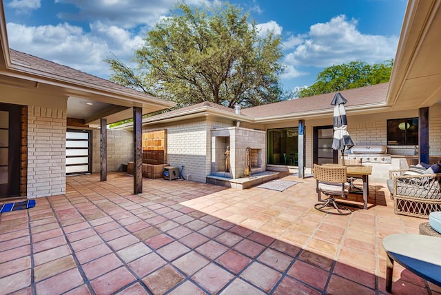 909 Pine Ct, Midland, TX 79705 - view of patio / terrace with an outdoor kitchen