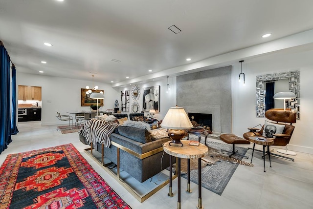 909 Pine Ct, Midland, TX 79705 - living area featuring recessed lighting, a chandelier, and a premium fireplace