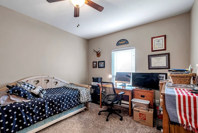 1210 S County Rd 1117, Midland, TX 79706 - bedroom featuring carpet flooring, ceiling fan, and a desk