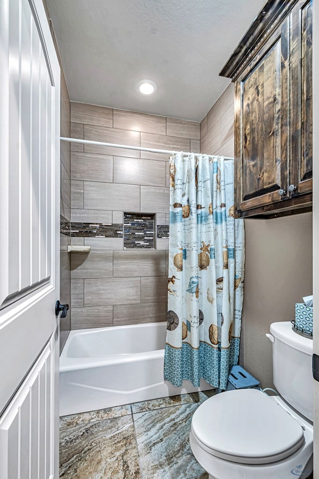 1210 S County Rd 1117, Midland, TX 79706 - bathroom featuring toilet, shower / bath combo, and recessed lighting