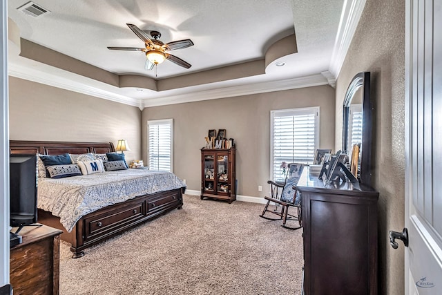 1210 S County Rd 1117, Midland, TX 79706 - bedroom featuring a tray ceiling, light colored carpet, multiple windows, crown molding, and baseboards