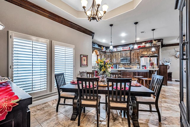 1210 S County Rd 1117, Midland, TX 79706 - dining room featuring a chandelier and ornamental molding