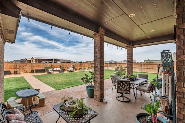 1210 S County Rd 1117, Midland, TX 79706 - view of patio featuring outdoor dining area