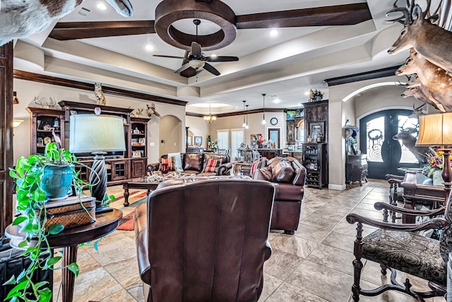 1210 S County Rd 1117, Midland, TX 79706 - living area featuring arched walkways, ceiling fan, ornamental molding, a tray ceiling, and recessed lighting